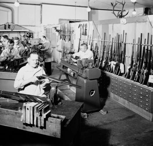 Interior view of men participating in gun manufacturing workshop at Sports department in Store for Men of Marshall Field & Company on the corner of Washignton and Wabash, Chicago, Illinois, October 9, 1946.